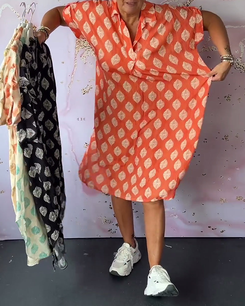 ליאורה | שמלת אביב רחבה עם צווארון רוורס ושרוולים קצרים