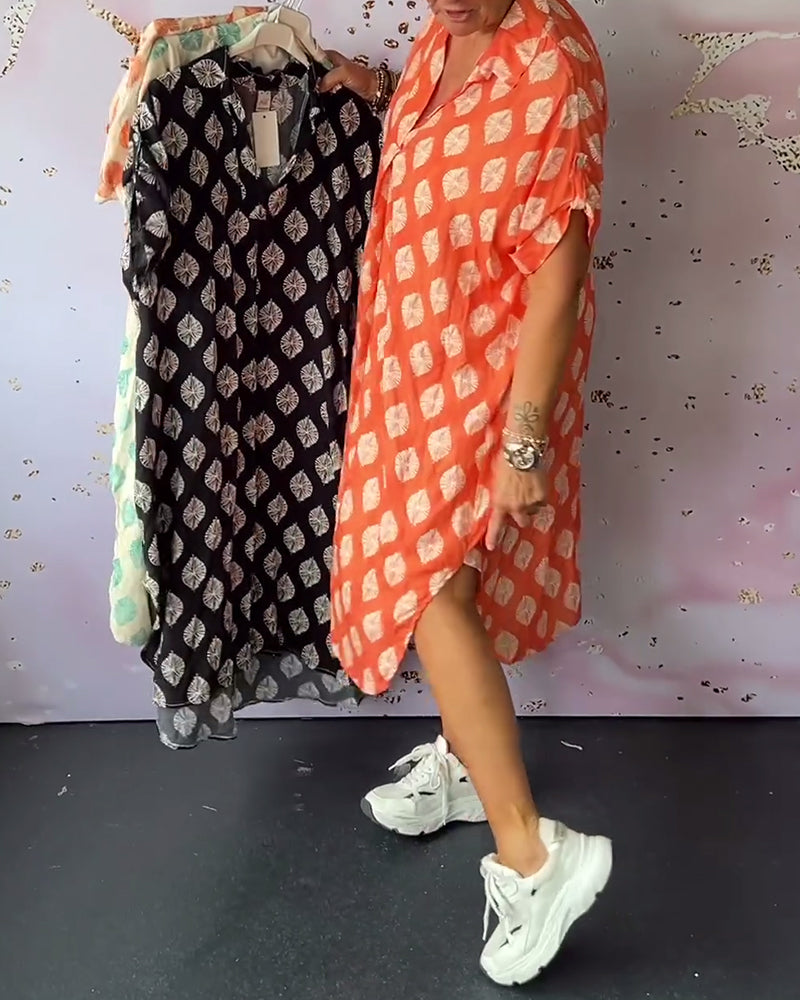 ליאורה | שמלת אביב רחבה עם צווארון רוורס ושרוולים קצרים