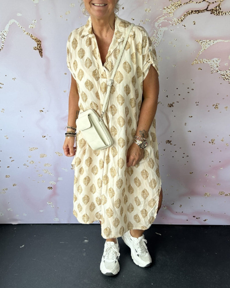 ליאורה | שמלת אביב רחבה עם צווארון רוורס ושרוולים קצרים