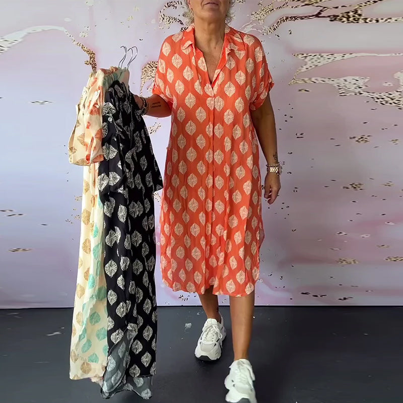 ליאורה | שמלת אביב רחבה עם צווארון רוורס ושרוולים קצרים