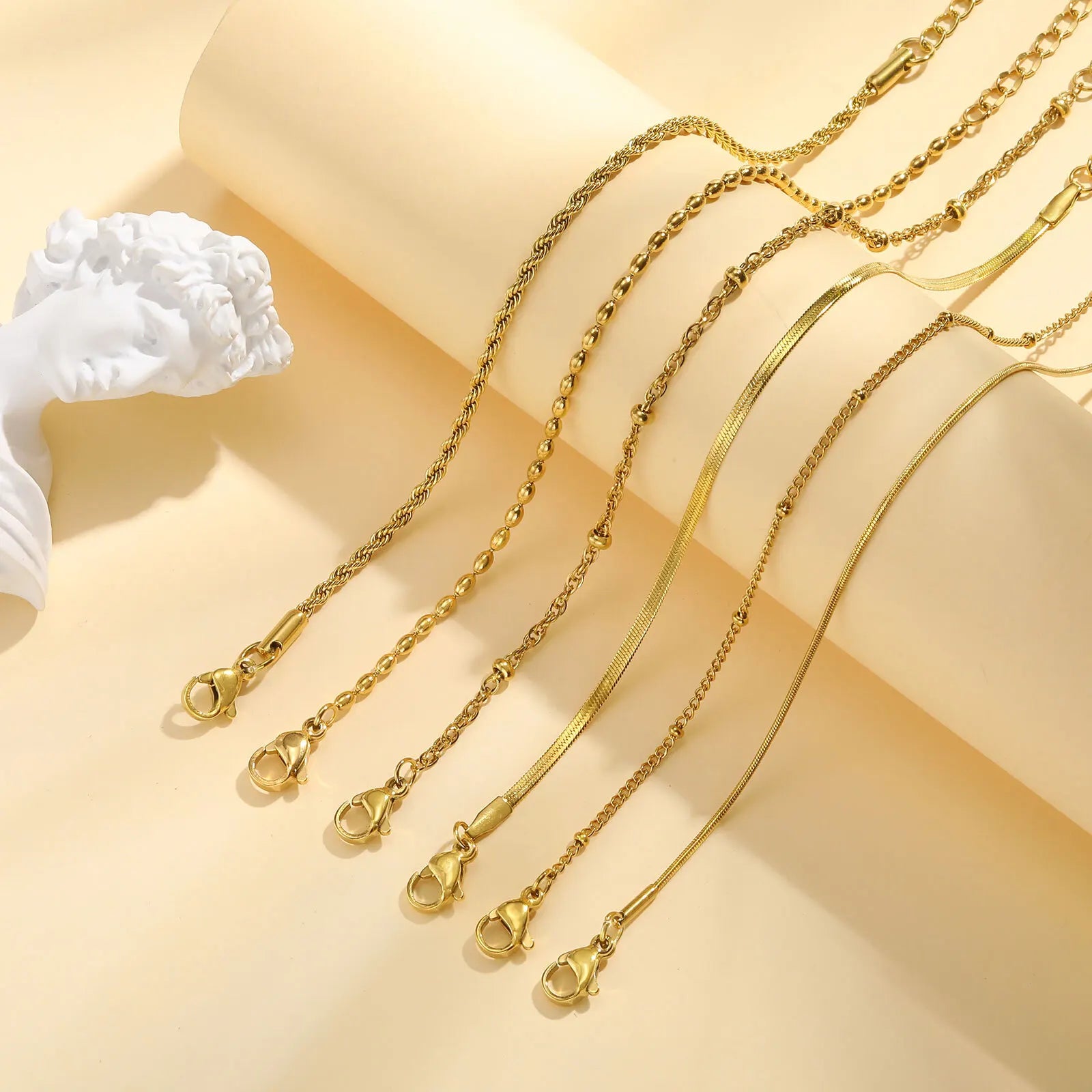 אלה |  צמיד דק מנירוסטה בציפוי זהב