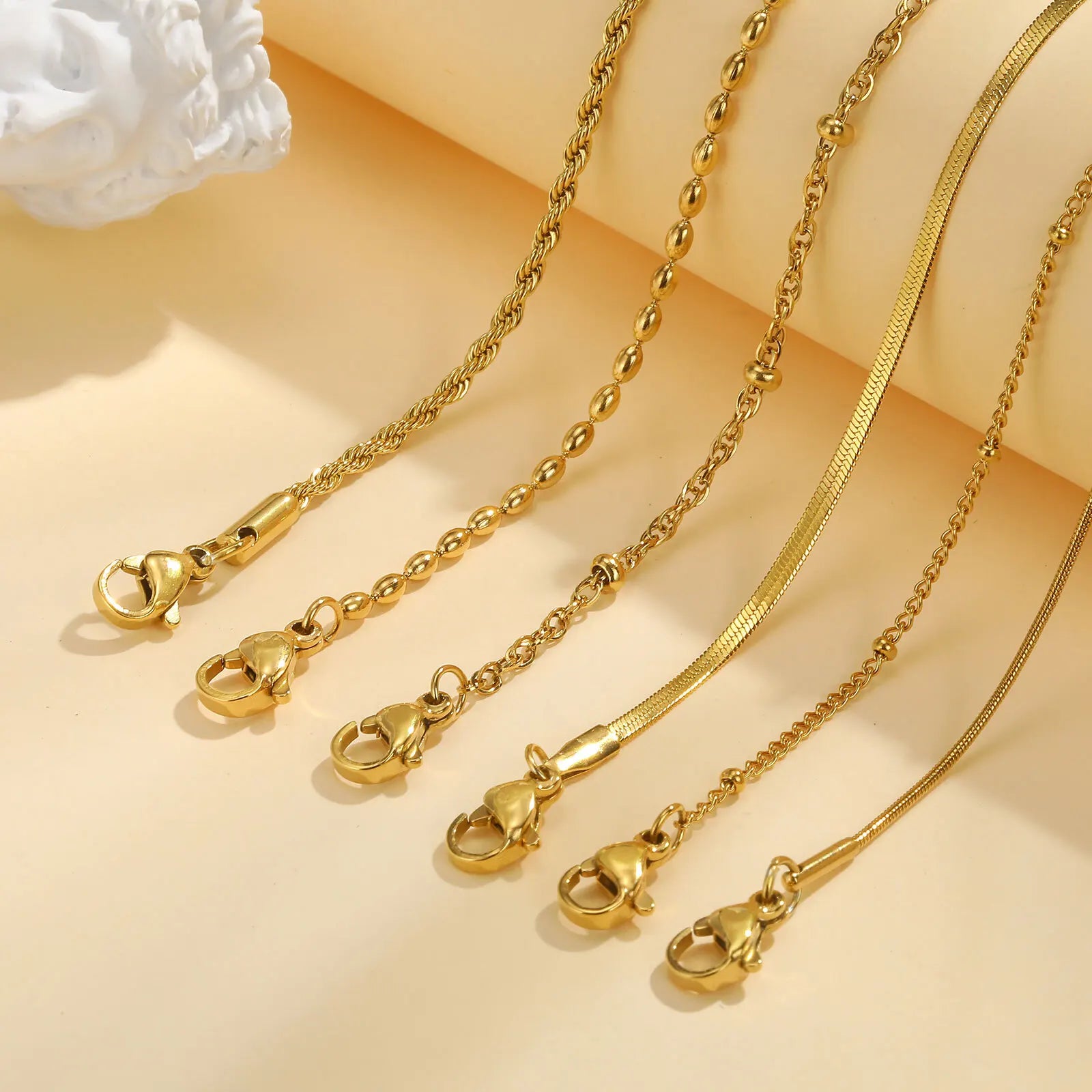 אלה |  צמיד דק מנירוסטה בציפוי זהב