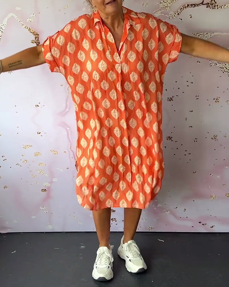 ליאורה | שמלת אביב רחבה עם צווארון רוורס ושרוולים קצרים